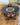 motso designed ceramic plate with handles and red beads and pempamsie symbol in the centre of the plate