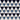 Wallpaper with 4 types of joined triangles. 2 large navy and white triangles, and small royal blue and grey triangles.  