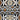 Ndebele pattern geometric wallpaper with with various geometric shapes in a repeating order. Colours brown, beige, black and white